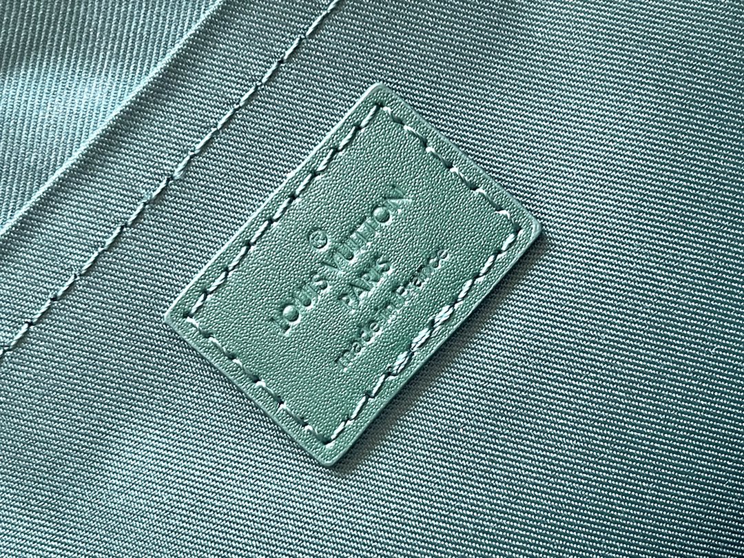 Pochette Voyage Souple 32 in Green Monogram Heritage Canvas