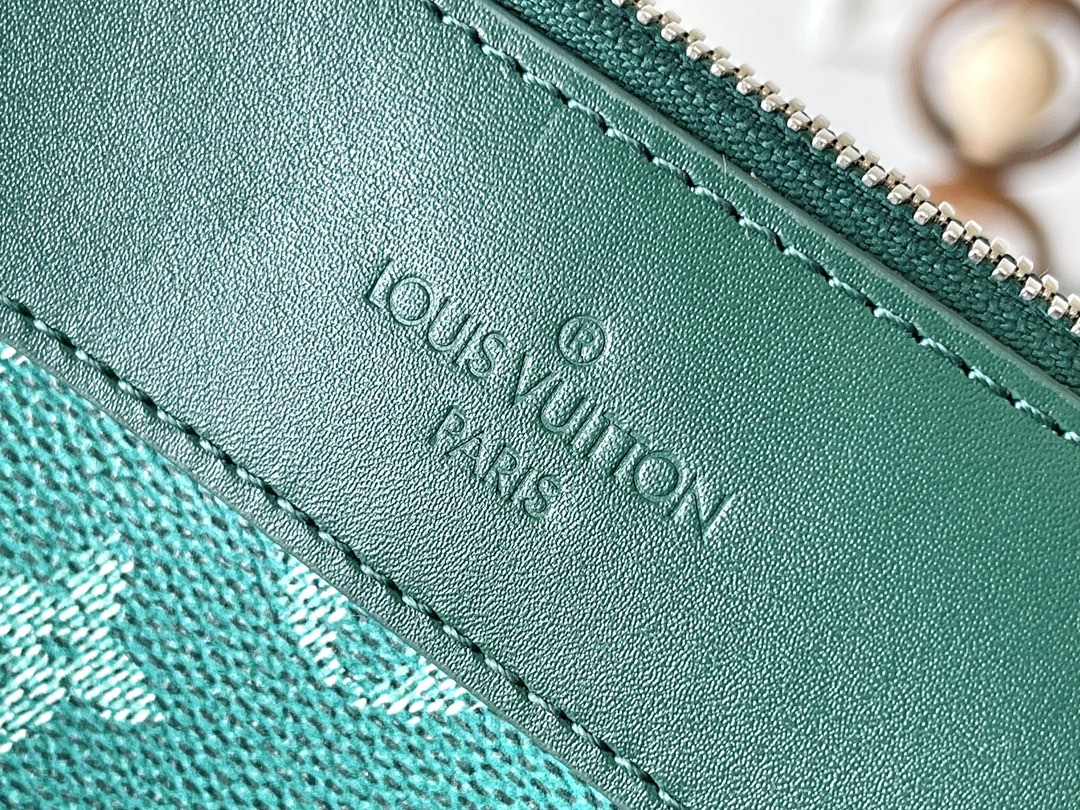 Pochette Voyage Souple 32 in Green Monogram Heritage Canvas