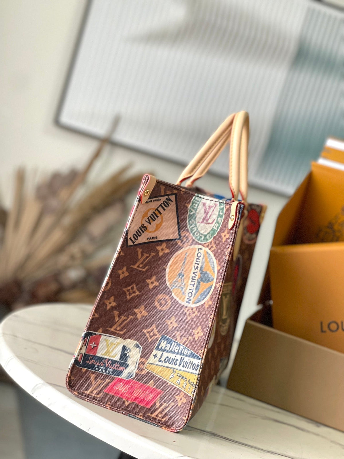 Onthego Voyage 35 in Brown Monogram Canvas with Vintage Hotel Labels