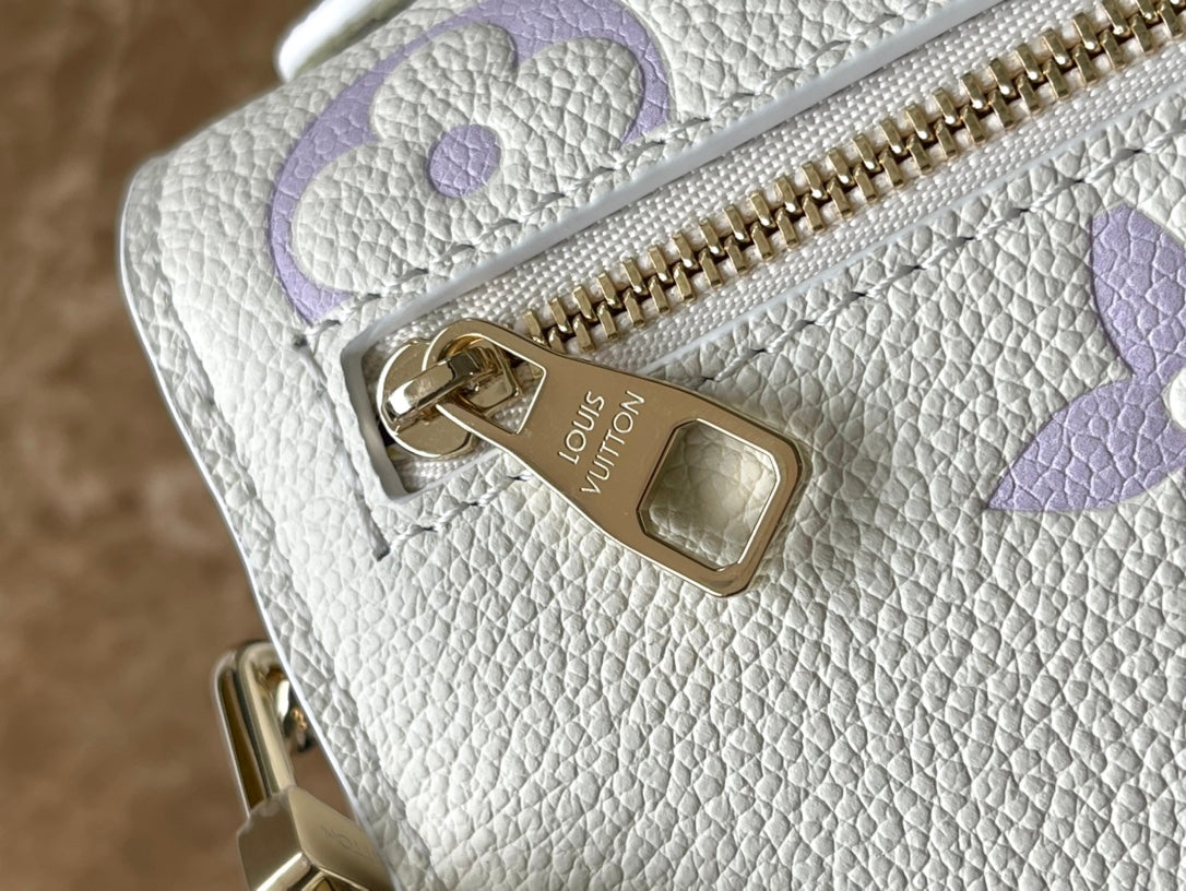 Pochette Metis East West 21 in White Purple Monogram Empreinte Leather