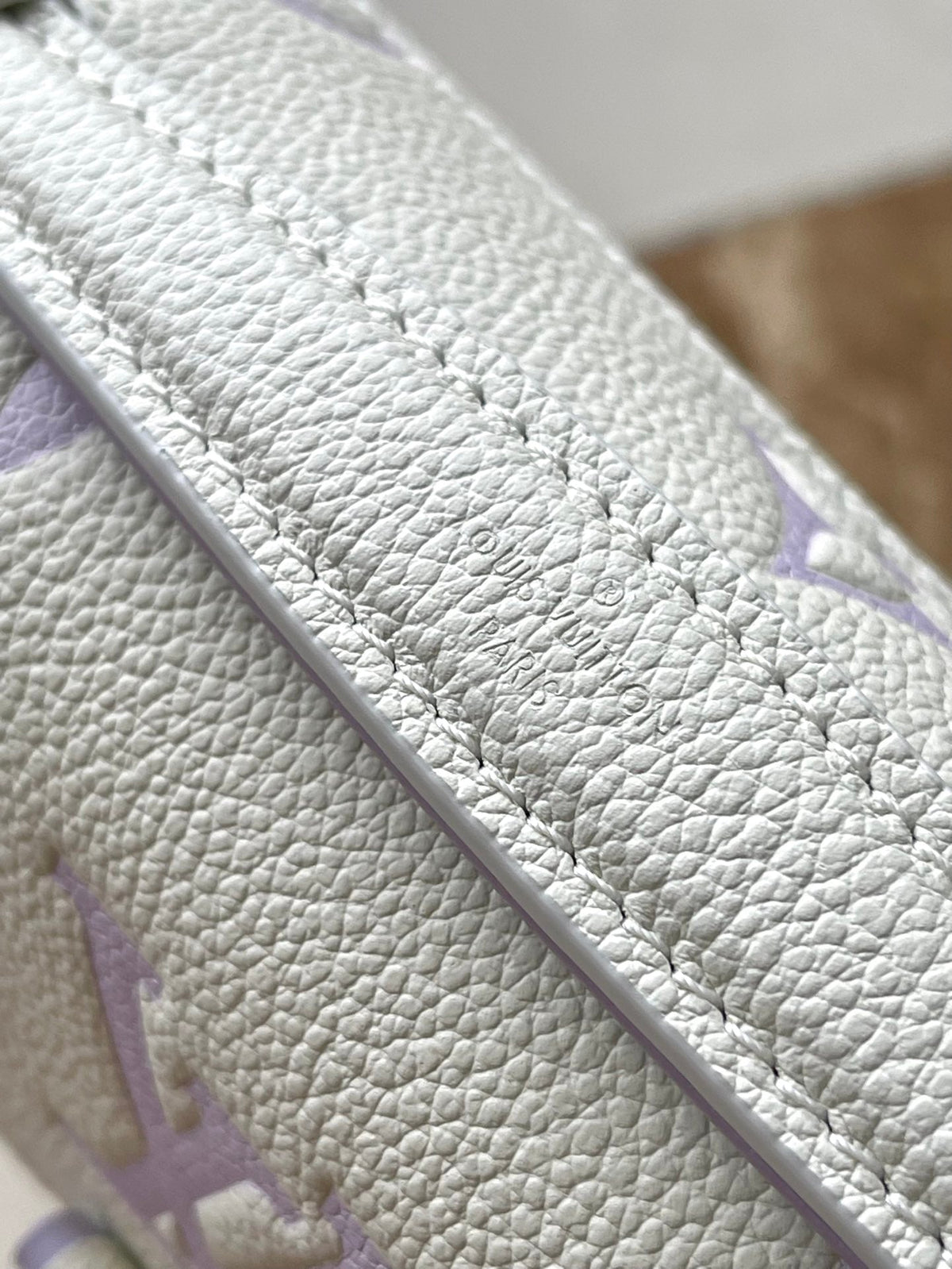 Pochette Metis East West 21 in White Purple Monogram Empreinte Leather