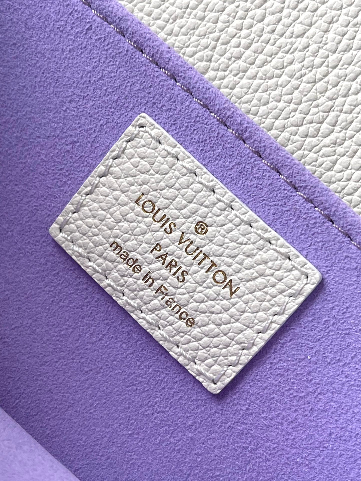 Pochette Metis East West 21 in White Purple Monogram Empreinte Leather