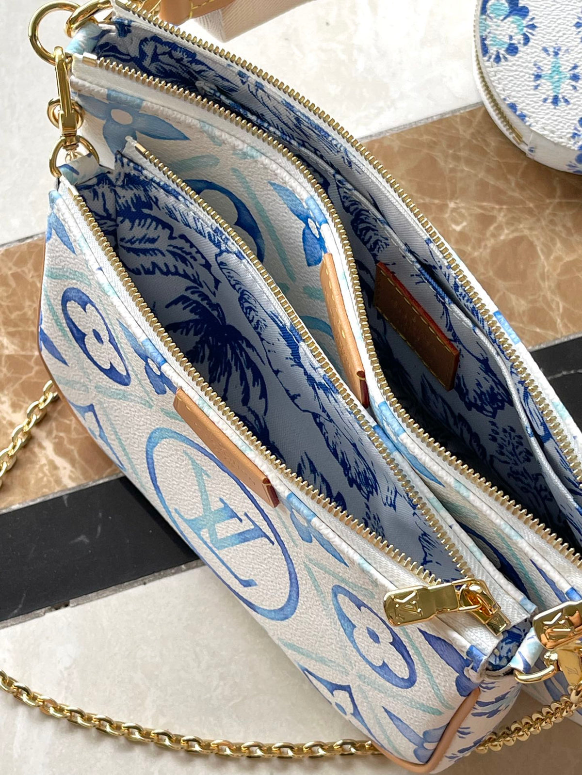 Multi Pochette Accessoires 24 in Lagoon Blue Monogram Tiles Canvas Gold Hardware