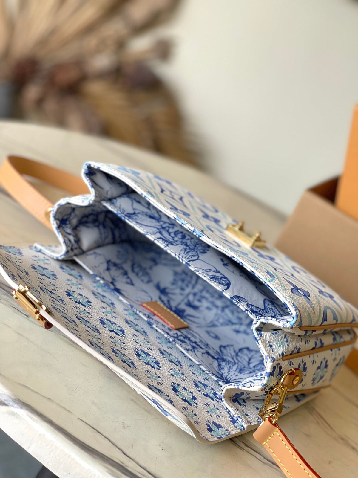 Pochette Métis 25 in Lagoon Blue Monogram Tiles Canvas Gold Hardware