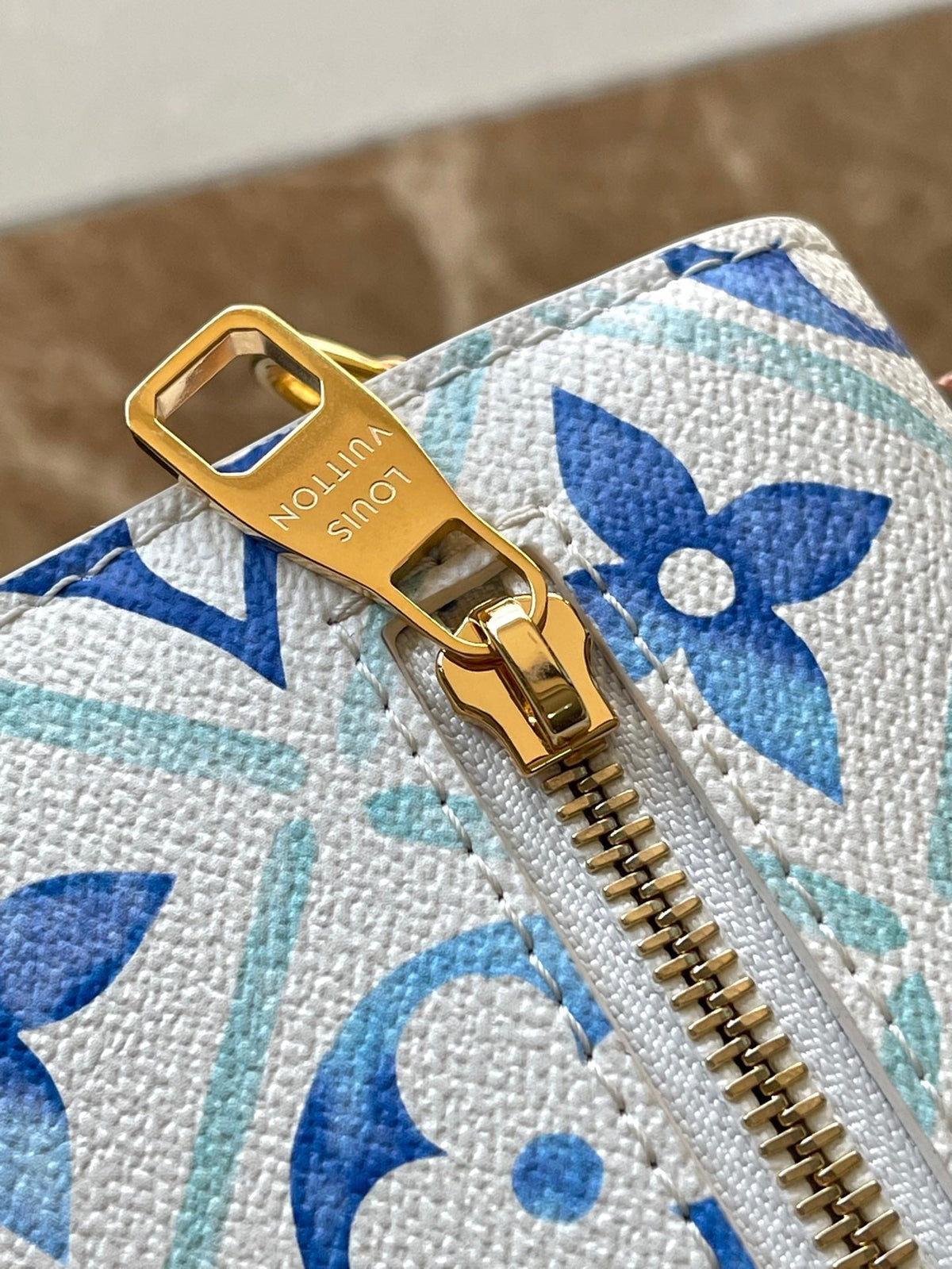 Pochette Métis 25 in Lagoon Blue Monogram Tiles Canvas Gold Hardware