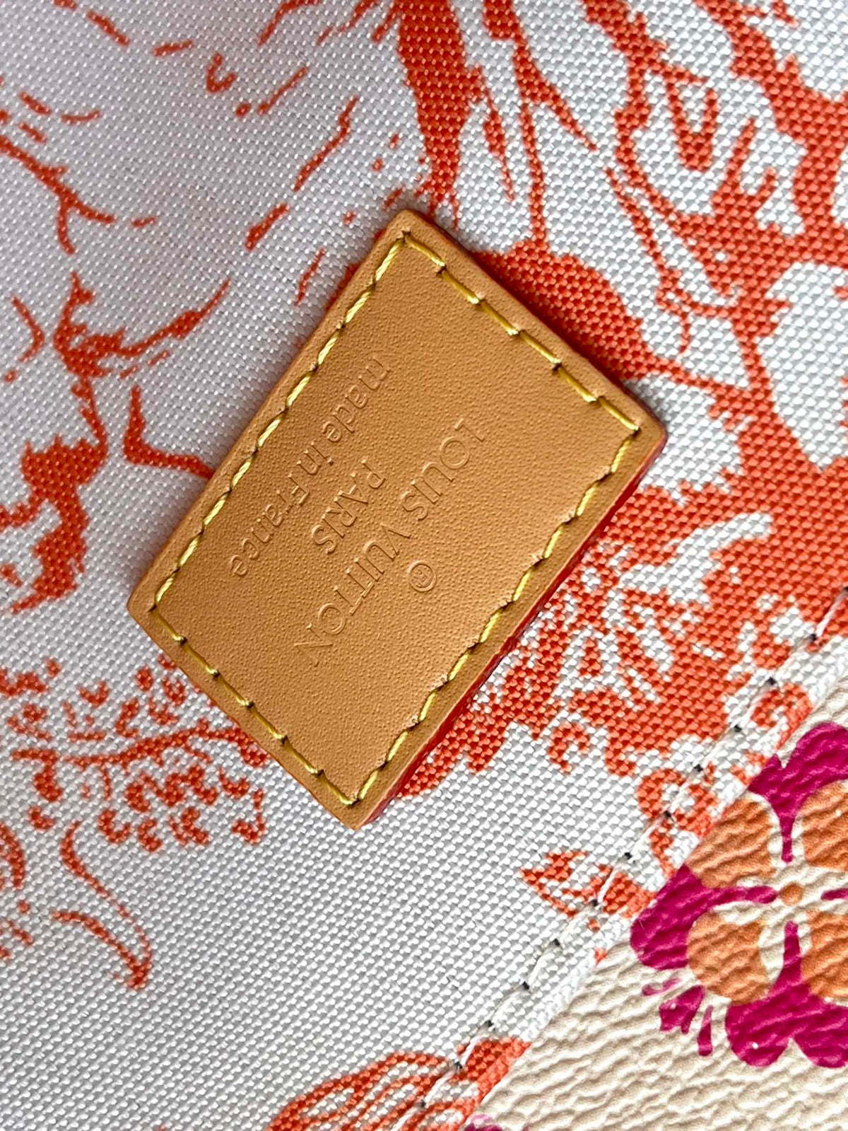 Pochette Métis 25 in Coral Monogram Tiles Canvas Gold Hardware