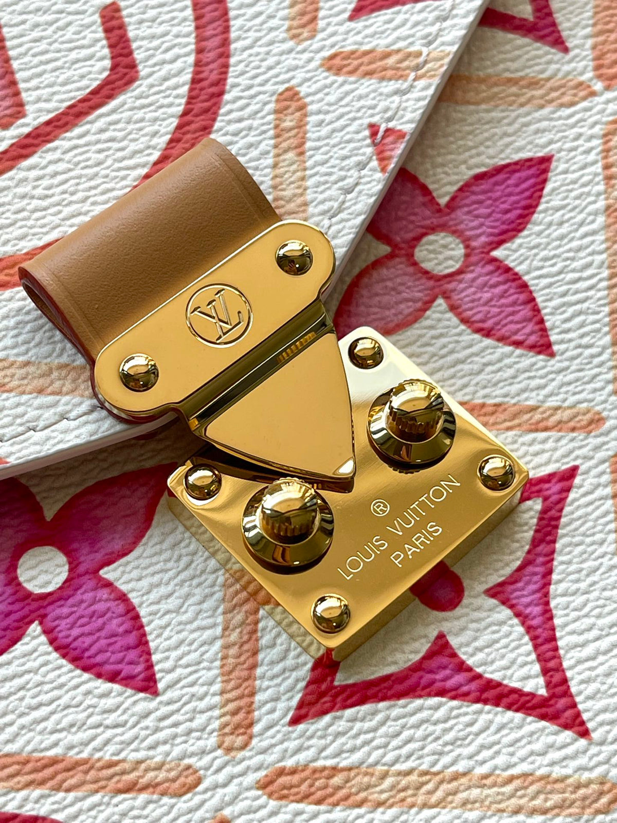 Pochette Métis 25 in Coral Monogram Tiles Canvas Gold Hardware