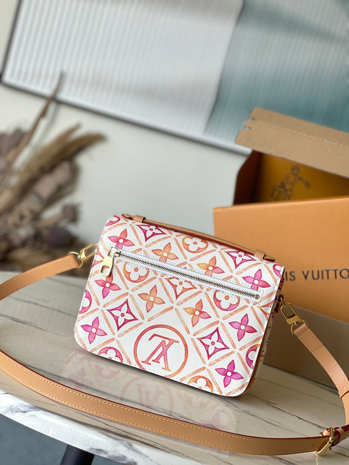 Pochette Métis 25 in Coral Monogram Tiles Canvas Gold Hardware