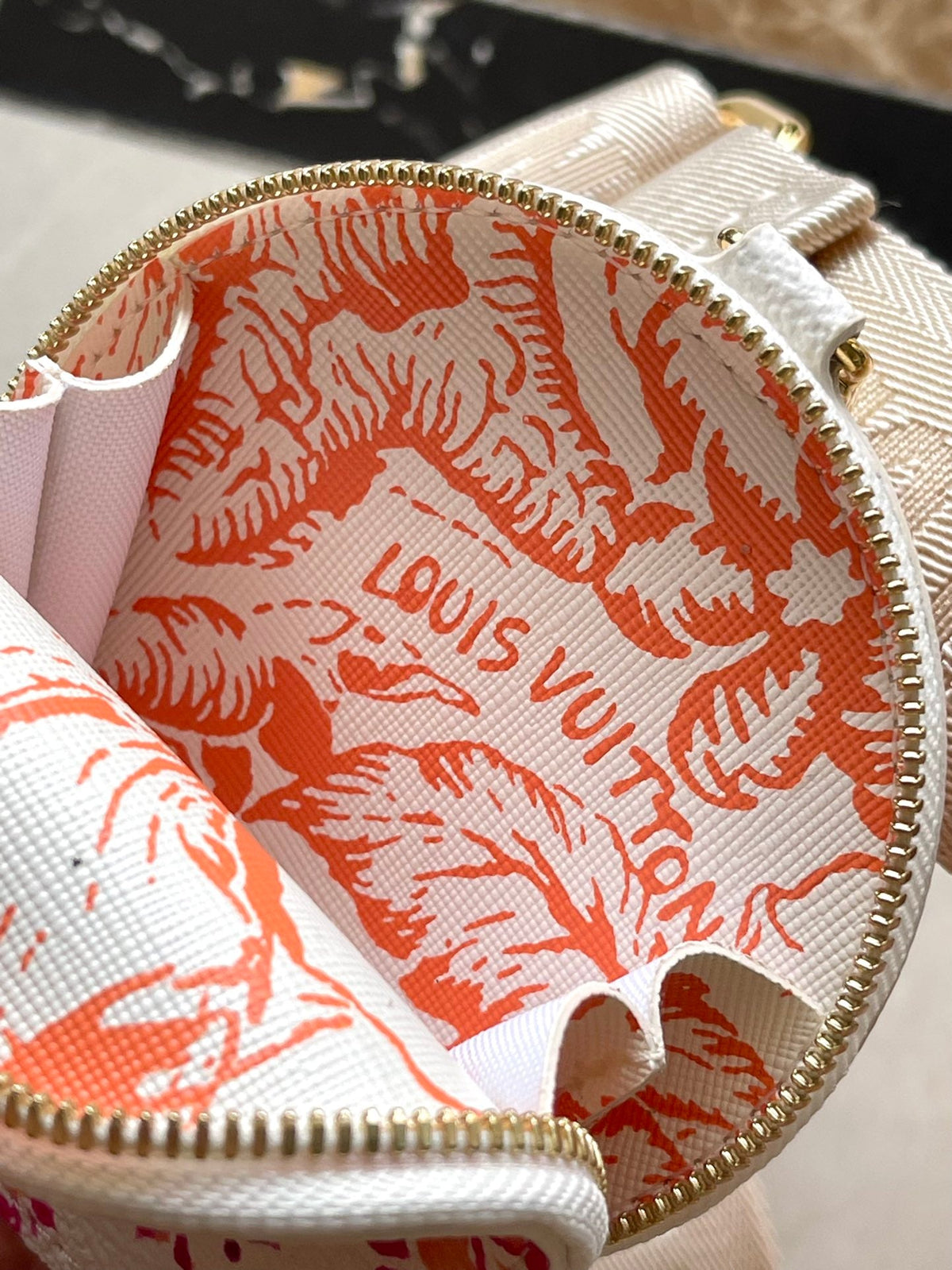 Onthego East West 25 in Coral Monogram Tiles Canvas