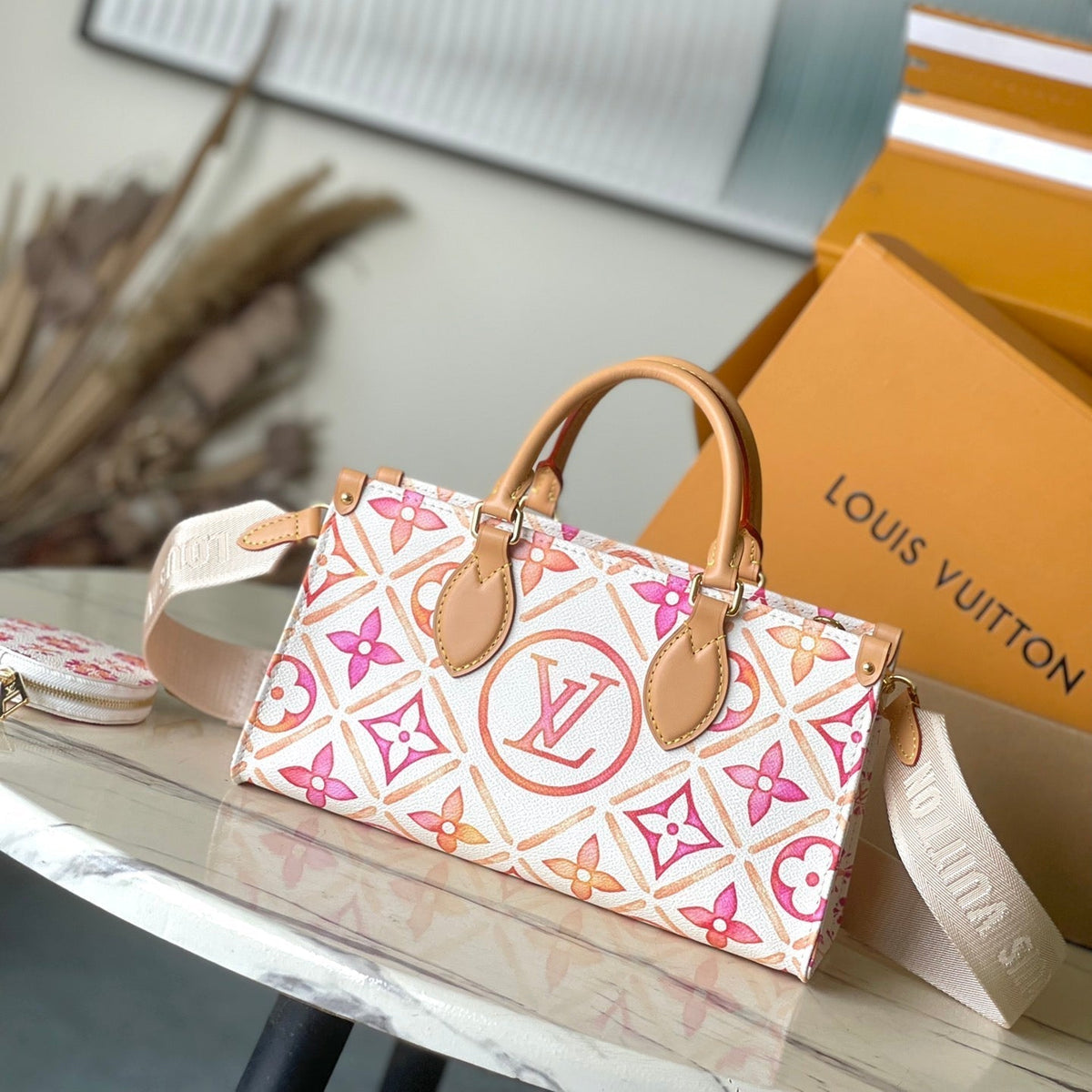 Onthego East West 25 in Coral Monogram Tiles Canvas