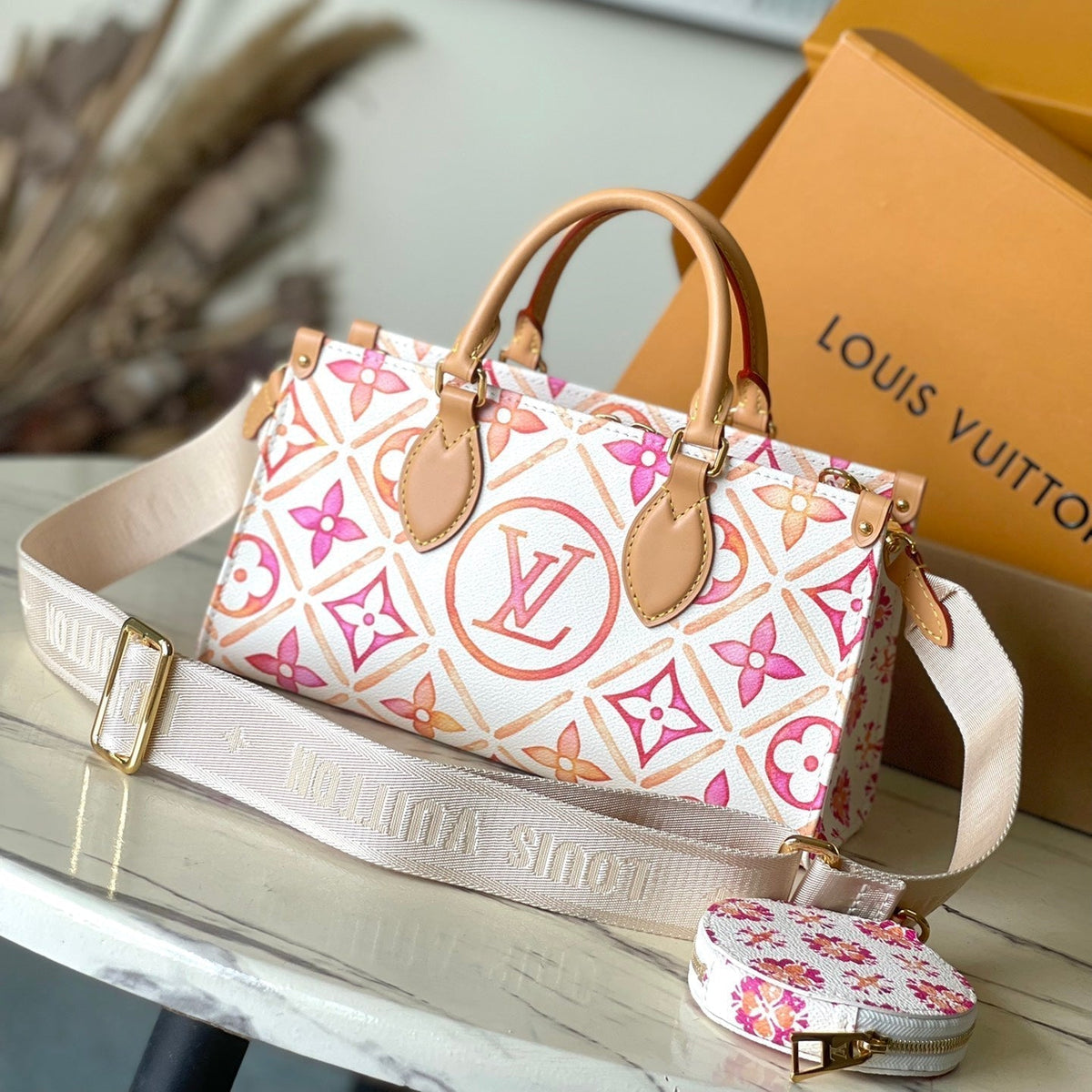 Onthego East West 25 in Coral Monogram Tiles Canvas