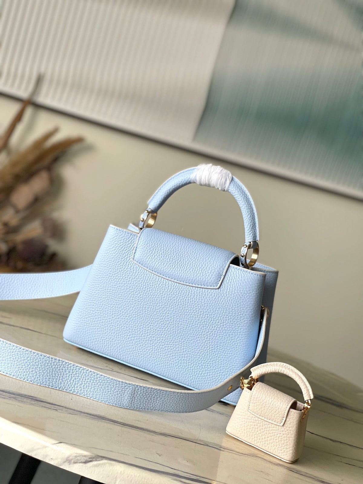 Capucines BB 26 in Candy Blue Taurillon Gold Hardware