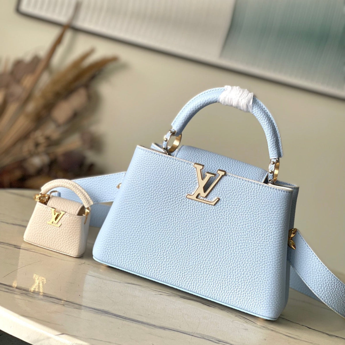 Capucines BB 26 in Candy Blue Taurillon Gold Hardware