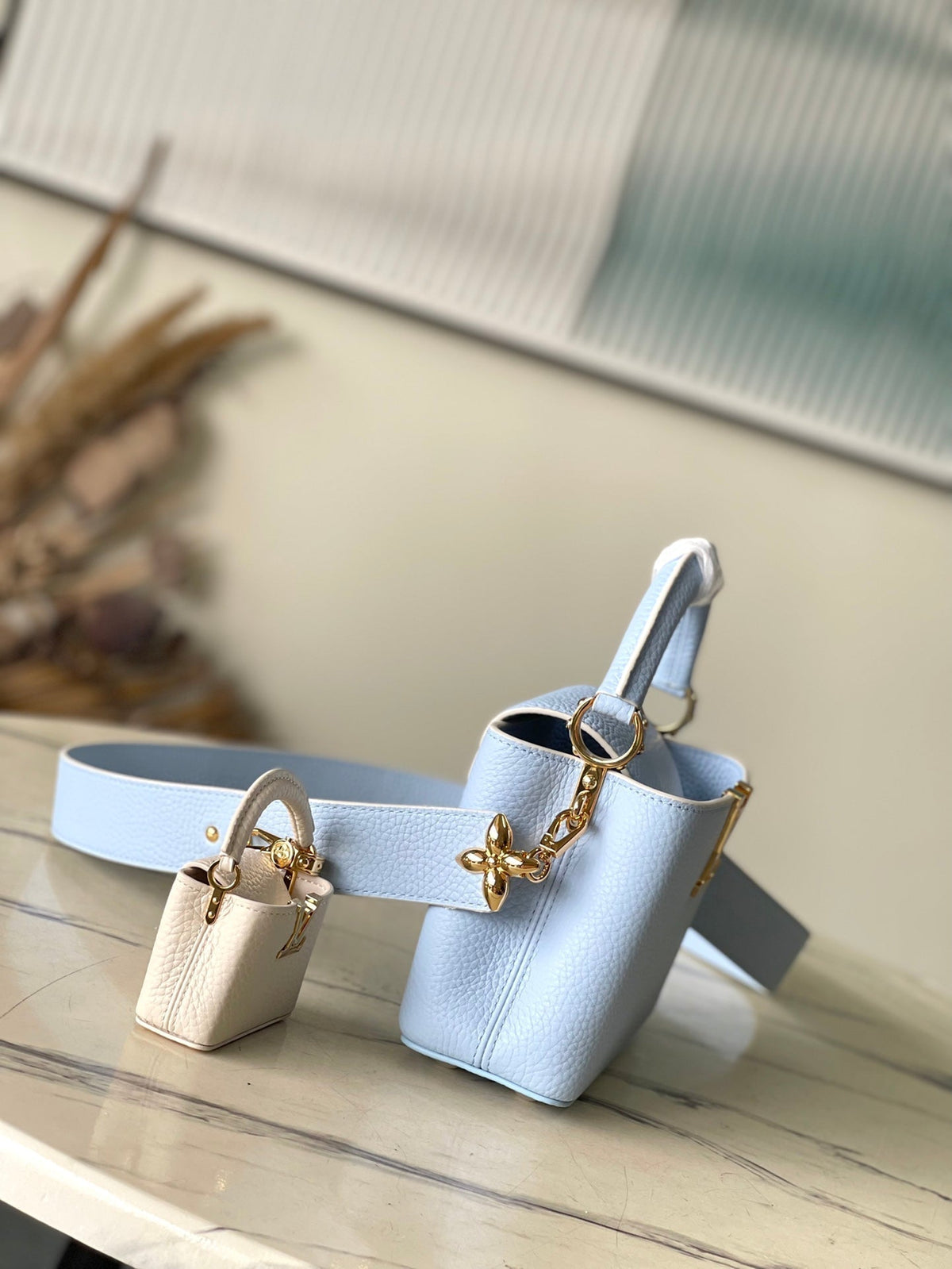 Capucines Mini 21 in Candy Blue Taurillon Gold Hardware