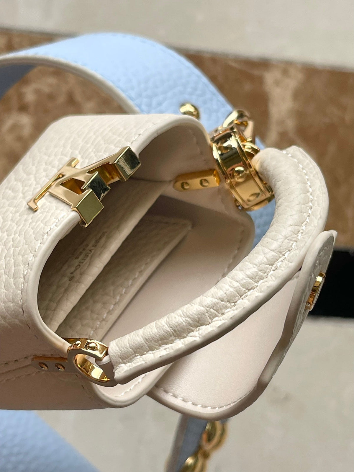 Capucines Mini 21 in Candy Blue Taurillon Gold Hardware