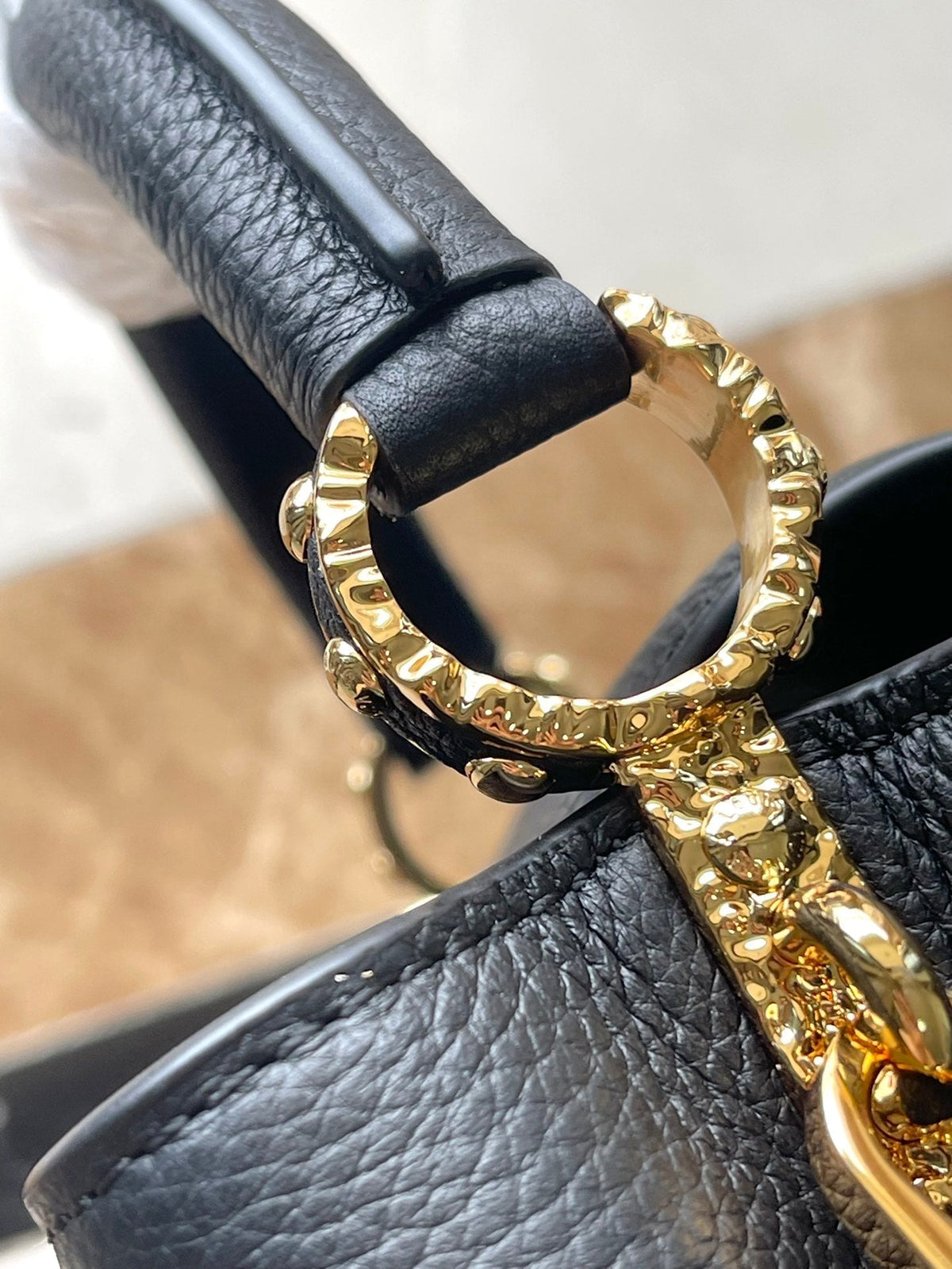 Capucines East-west Mini 22 in Black Calfskin Gold Hardware