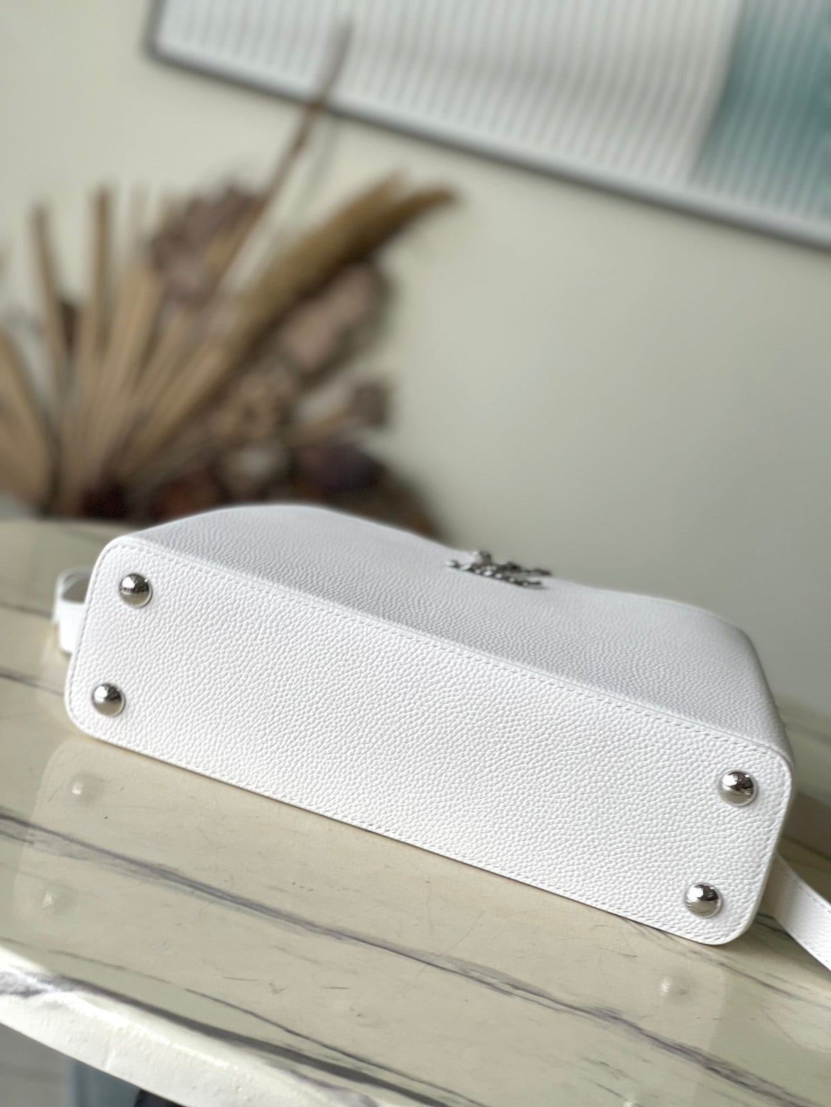 Capucines East-west 33 in White Calfskin Silver Hardware