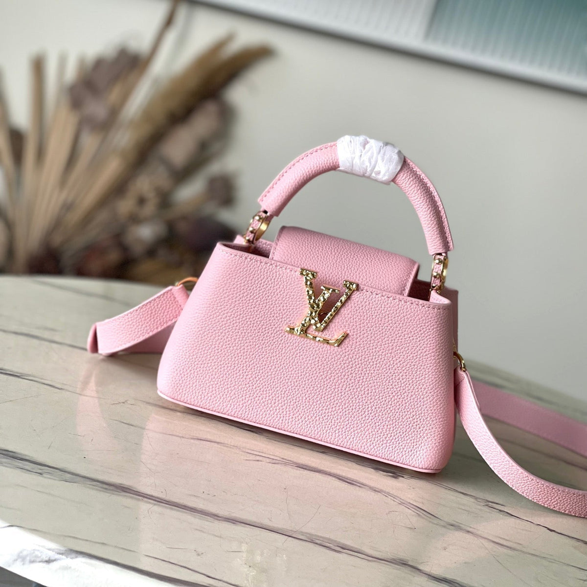 Capucines East-west Mini 22 in Blush Pink Calfskin Gold Hardware