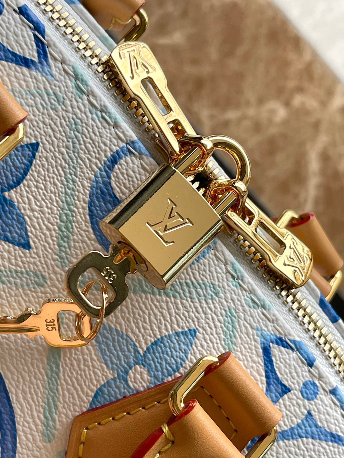 Speedy Bandoulière 20 in Lagoon Blue Monogram Tiles Canvas Gold Buckle