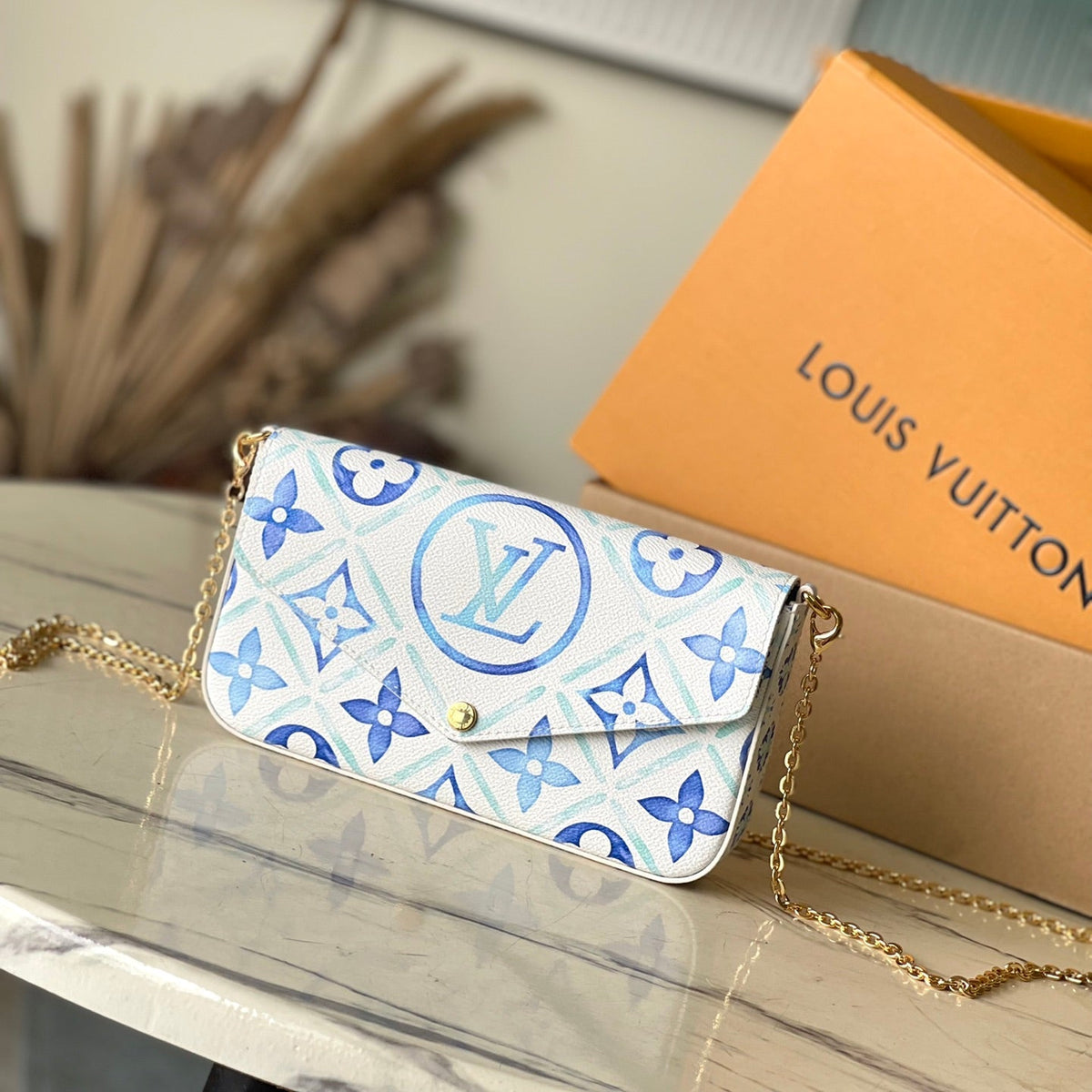 Félicie Pochette 21 in Lagoon Blue Monogram Tiles Canvas