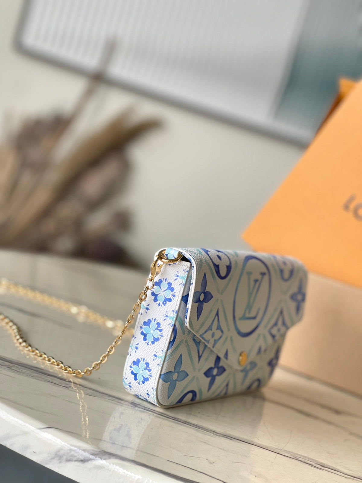 Félicie Pochette 21 in Lagoon Blue Monogram Tiles Canvas