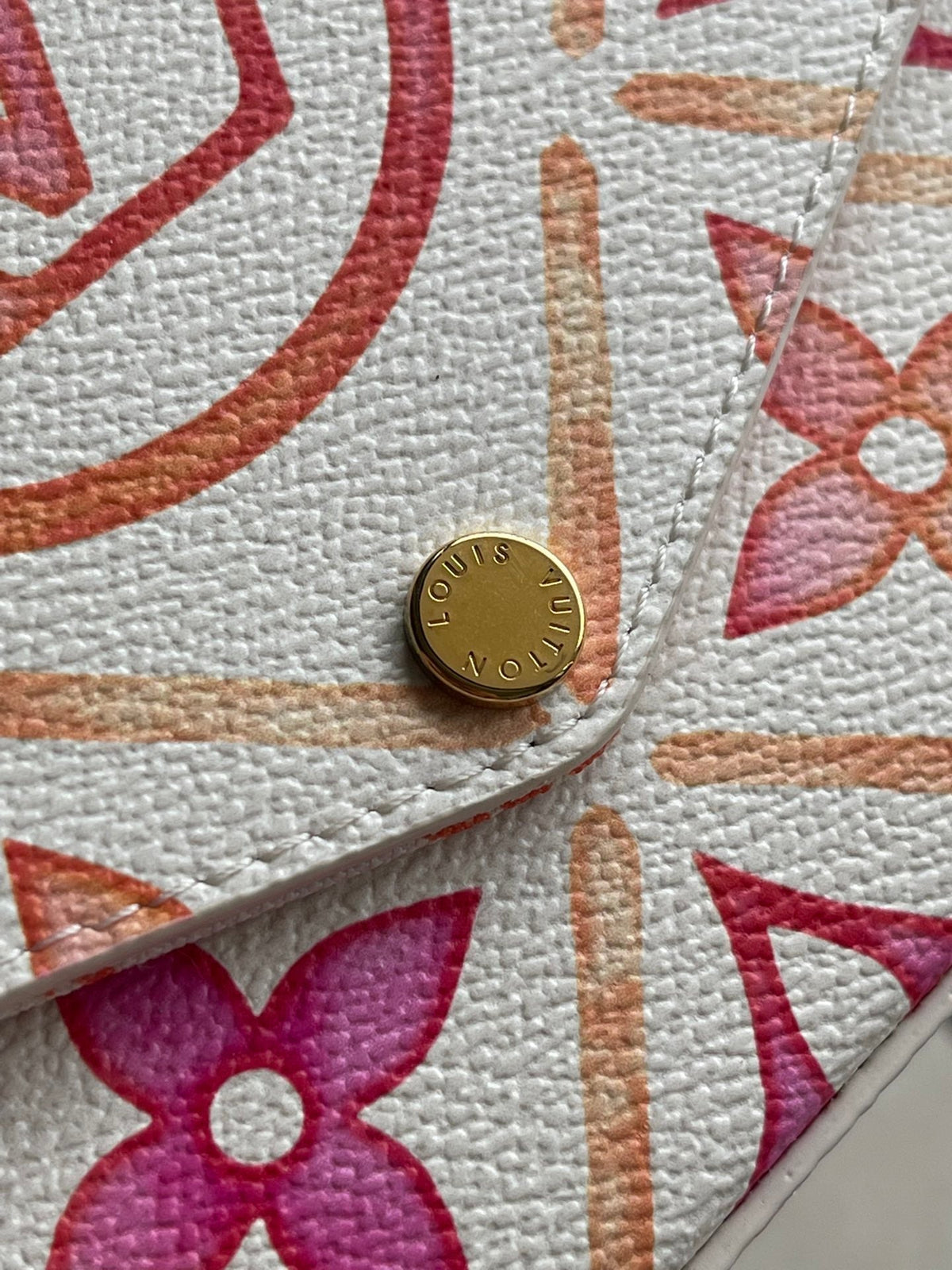 Félicie Pochette 21 in Coral Monogram Tiles Canvas