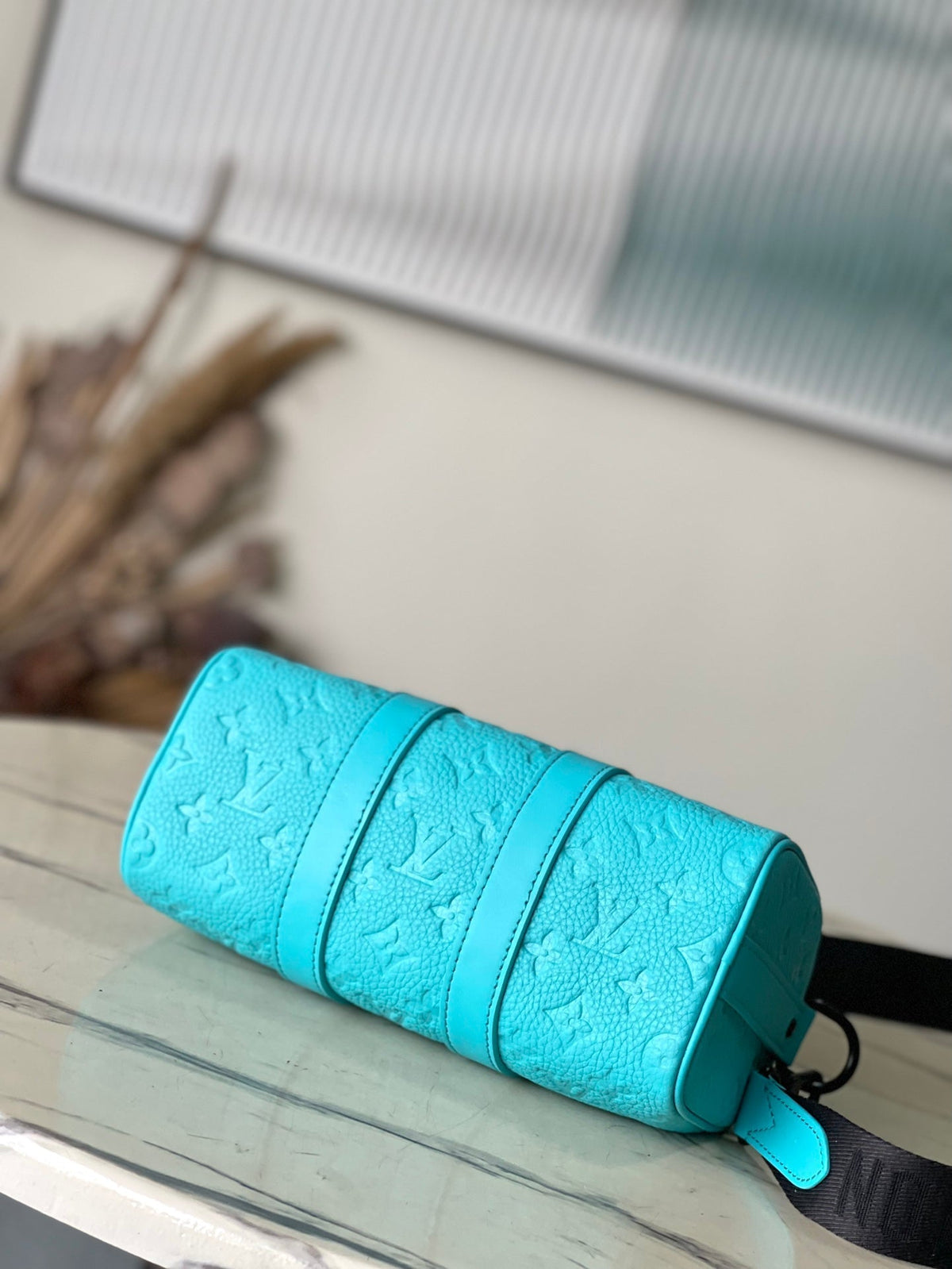 Keepall Bandoulière 25 in Turquoise Blue Monogram Embossed Calfskin