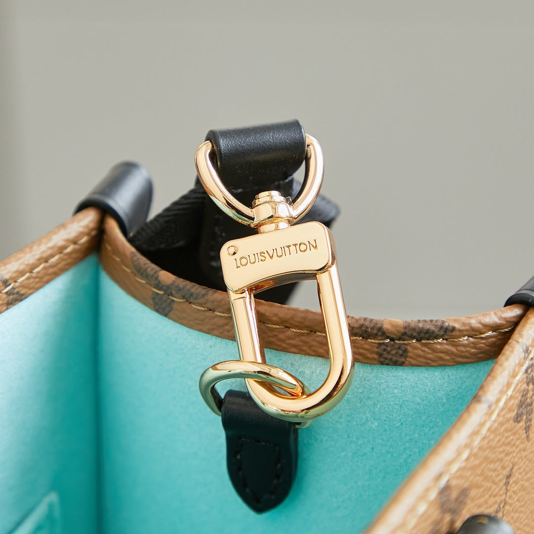 Onthego PM 25 in Brown Monogram Canvas with Duck Shape