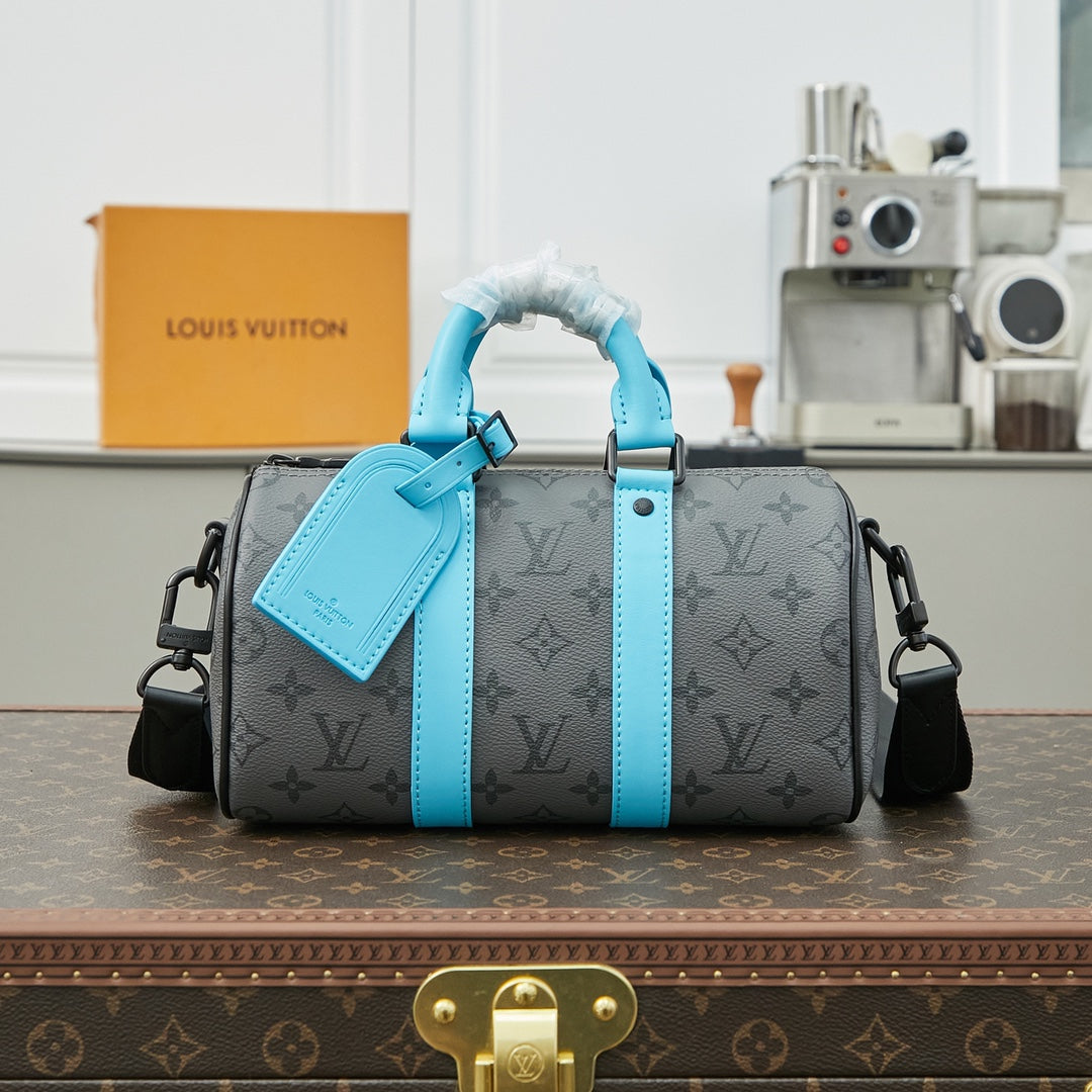 Keepall Bandoulière 25 in Gun Metal Monogram Eclipse Canvas Mix Turquoise Calfskin