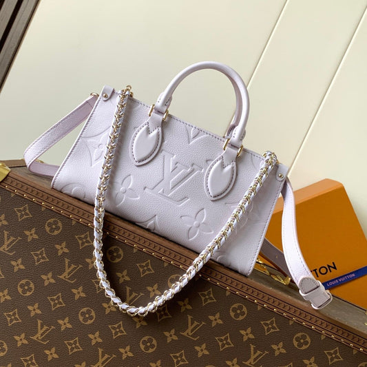 25S Onthego East West Bag 25 in Light Lavender Calfskin Monogram Empreinte