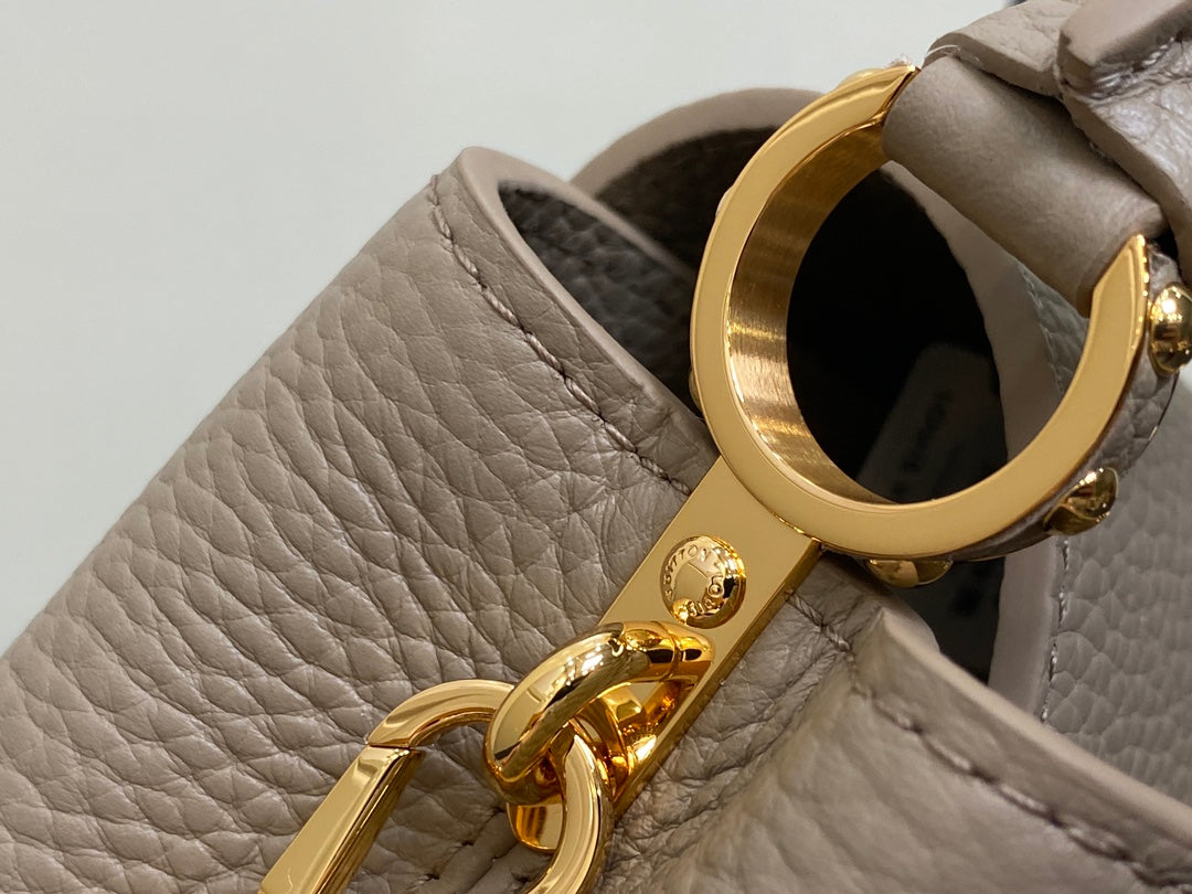 Capucines Mini 21 in Khaki Brown Taurillon